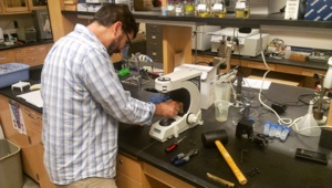 Working with a rubber mallet and Leica equipment